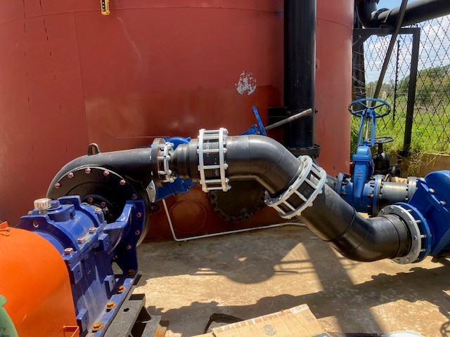 Industrial piping system with valves and pump